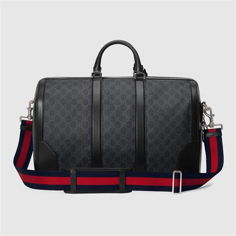 gucci supreme carry on duffle